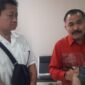 Kamaruddin Simanjuntak usai lapor di SPKT Bareskrim Polri bersama kliennya, Jhon Wimin. (Dok. Ist)