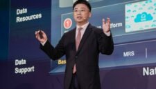 Huawei's Saeed Xia presents onstage at MWC 2026